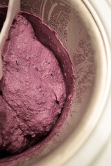 Blueberry Ice Cream, Gelato, mixing in Ice Cream Maker, an easy machine for homemade ice cream.