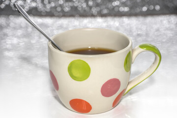 Obraz na płótnie Canvas Polka dot coffee cup and black coffee