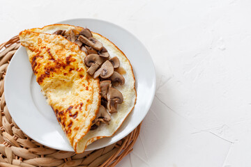 Rustic style omelet with mushrooms