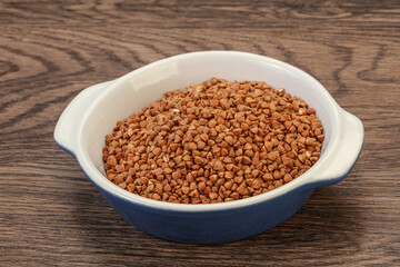 Raw buсkwheat cereal in the bowl