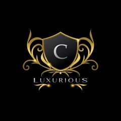 Golden Letter C Luxurious Shield Logo, vector design concept for luxuries business identity