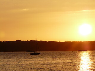 Obraz na płótnie Canvas sunset boat