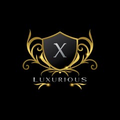 Golden Letter W Luxurious Shield Logo, vector design concept for luxuries business identity