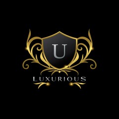 Golden Letter U Luxurious Shield Logo, vector design concept for luxuries business identity