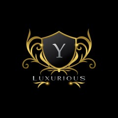 Golden Letter Y Luxurious Shield Logo, vector design concept for luxuries business identity