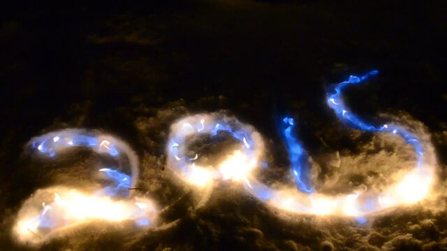blue flames on snowy spelling 2015