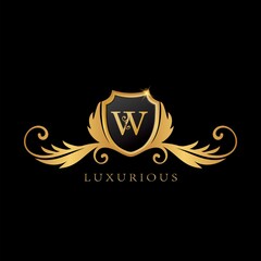 Golden W Logo Luxurious Shield logo design concept.