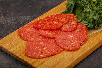 Italian spycy pepperoni sausage slices