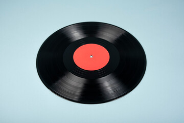 Fototapeta na wymiar Black vinyl record with red label