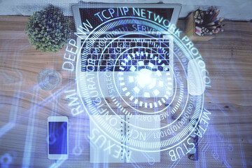 Double exposure of data theme drawing hologram over topview work table background with computer. Concept of technology.
