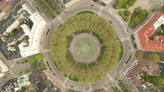 Aerial view Karlaplan Park, Square and Fountain in Stockholm, Sweden. Spinning shot.