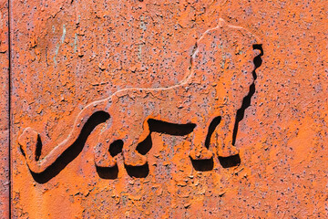 Rusty iron lion on old gates © Nadiia