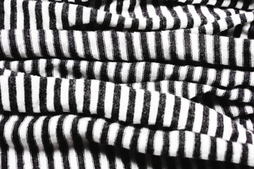 Vertical striped background, white, blue, black strip. fabric.