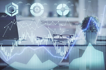 Double exposure of financial graph drawing and office interior background. Concept of stock market.