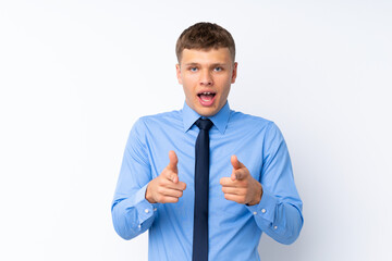 Young handsome businessman points finger at you