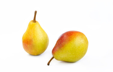 pear fruit, yellow fruits with red sides on a light background