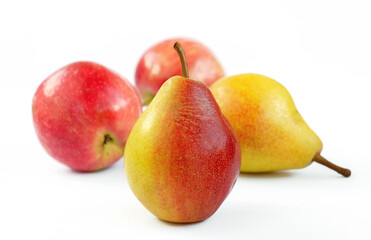 pear fruit, yellow fruits with red sides on a light background