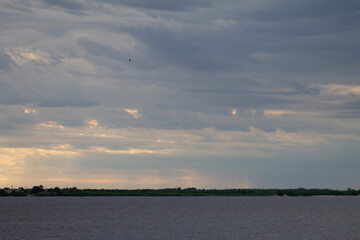 seascape with a view of the coast, horizon and clouds