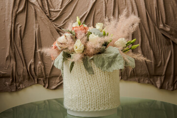 beautiful original bouquet of white cotton flowers and assorted roses
