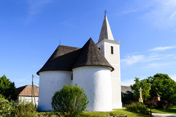 Fototapeta na wymiar White church in green enviroment
