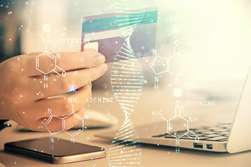 Multi exposure of woman on-line shopping holding a credit card and DNA drawing. Medical education E-learning concept.