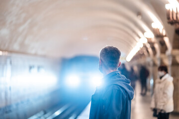 People wait at a subway station in Kiev.