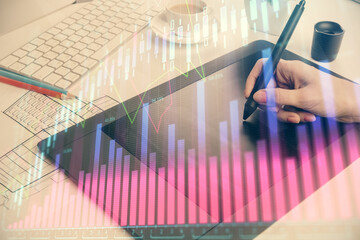 Double exposure of financial graph sketch hologram and woman holding and using a mobile device. Stock exchange concept.