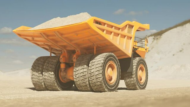 Big dump truck driving through the middle of a vast sand quarry in a loop. 4KHD
