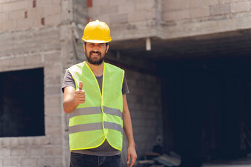 Construction worker gesturing thumbs up. Flu worker background