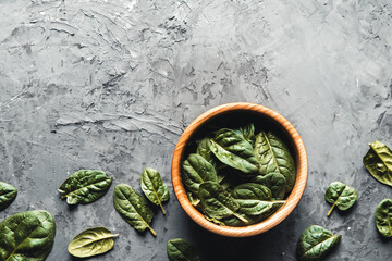 Green food background on stone table top view. Healthy food, vegan, eco products.