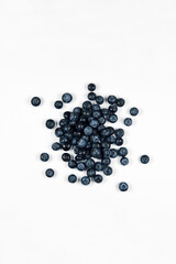 nature and healthy food concept - Top view of fresh blueberries isolated on white background
