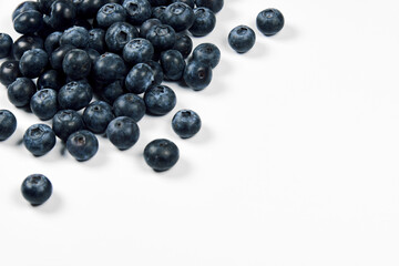 nature and healthy food concept - Top view of fresh blueberries isolated on white background. Copy space
