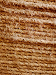 The hairy texture of the winded brown rope, the abstract structure