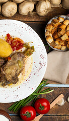 delicious meat and potato meal on dark background