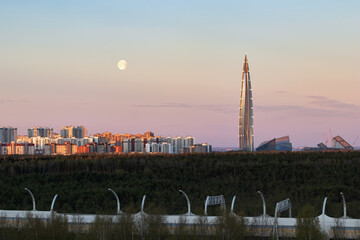 Morning city landscape on the outskirts of St. Petersburg. Panoramic view of the dawn in the city