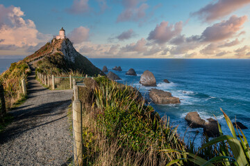 The path leading to the historic landmark Nugget Point Lighthouse and its amazing surrounding rock and island formations - Powered by Adobe