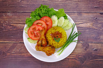 Biryani rice with crispy fried chicken wings, Halal food / Muslim food, top view