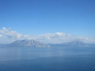View of blue sky and ocean seen from a cruise ship between ports of Italy and Greece