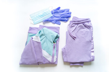 Fototapeta premium Mask gloves and sports uniform. Doing sports.