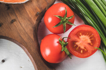 Fresh whole and half cut tomatoes