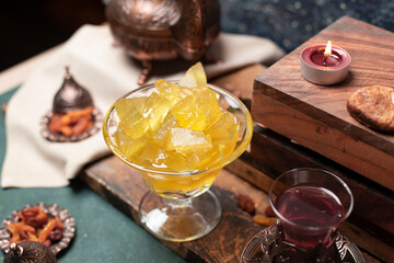 tea and watermelon jam with wooden background