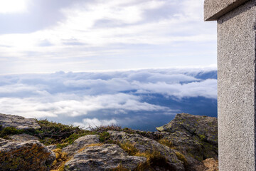 Fototapeta premium Stone shelter on top of the mountainous peak of Peñarala, in the Sierra de Guadarrama, Spain.