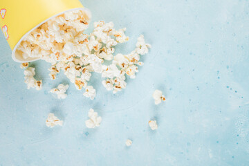 Popcorns out of a yellow container box