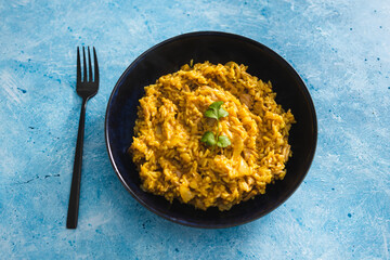 plant-based food, vegan creamy curry risotto with jackfruit
