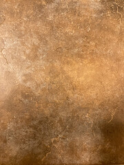 Background brown tan textured tile with blur and graduated patterns of  irregular color