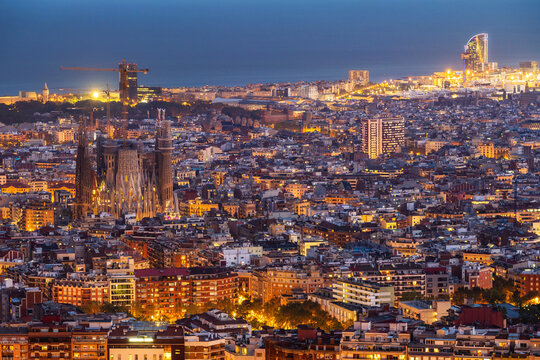 Aerial view of Barcelona cityscape at dusk, Spain. © R.M. Nunes