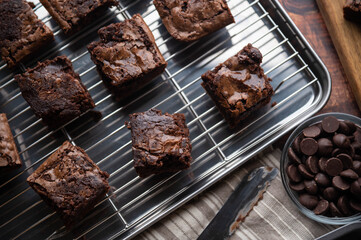chocolate brownies with ingredients and baking tools