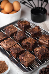 chocolate brownies with ingredients and baking tools