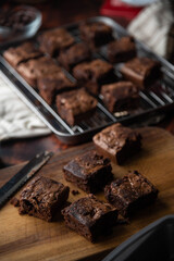 chocolate brownies with ingredients and baking tools