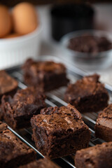 chocolate brownies with ingredients and baking tools